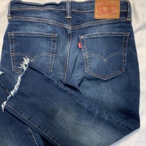 LEVIS 511 31X24 raw hem straight leg with elastin for stretch med wash EUC